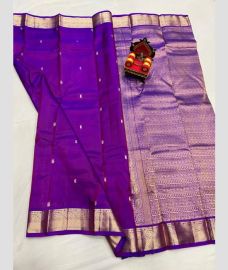 purple colour kanchi pattu sarees with All over Buttas design