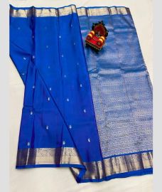 blue colour kanchi pattu sarees with All over Buttas design