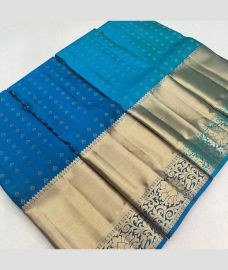 blue colour kanchi pattu sarees with All over Buttas design