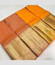 orange colour kanchi pattu sarees with All over Buttas design