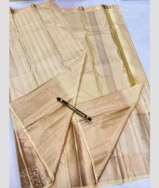 grey colour kanchi pattu sarees with All over Buttas design