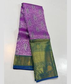 purple colour kanchi pattu sarees with All over design