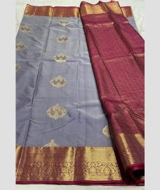 light blue and purple colour kanchi pattu sarees with Jari Border design