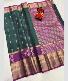 green and purple colour kanchi pattu sarees with All over Buttas design