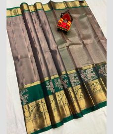 grey colour kanchi pattu sarees with All over Buttas design