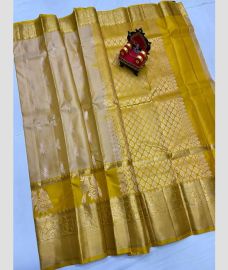 olive colour kanchi pattu sarees with All over Buttas design
