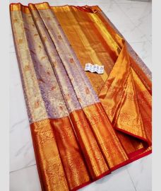 brown and light purple colour kuppadam pattu sarees with All over design