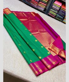 green and purple colour kuppadam pattu sarees with All over design