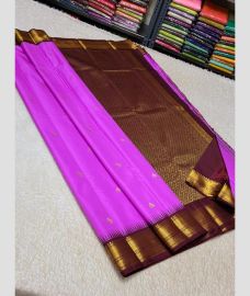 purple colour kuppadam pattu sarees with All over design