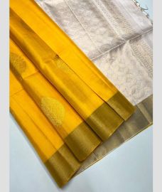 Mango Yellow and Half White soft silk kanchipuram sarees with All over Buttas design