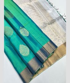 Turquoise and Half White soft silk kanchipuram sarees with All over Buttas design
