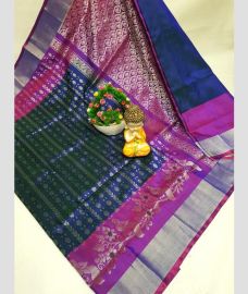 green and silver colour uppada pattu sarees with All over design