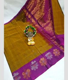 olive green colour uppada pattu sarees with All over Buttas design
