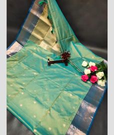 light blue colour uppada soft silk sarees with All over Buttas design