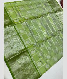 silver and light green colour venkatagiri pattu sarees with All over Checks and Buttas design
