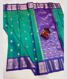 silver and green colour venkatagiri pattu sarees with All over design