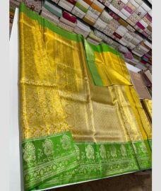 gold and green colour venkatagiri pattu sarees with All over design