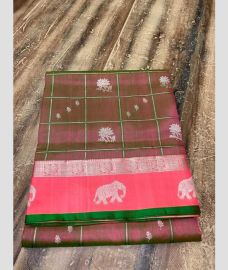 leaf green colour venkatagiri pattu sarees with All over Checks and Buttas design
