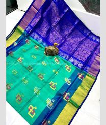 Aquamarine and Royal Blue color uppada pattu handloom saree with all over buttas design -UPDP0021918