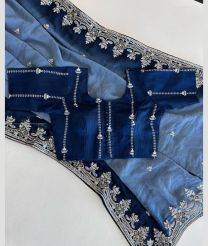Sky Blue and Navy Blue color Chiffon sarees with all over embroidery with piping attached design -CHIF0001988