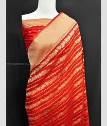 Red color Georgette sarees with all over zari weaving with fancy tassels having heavy wooven border design -GEOS0009504