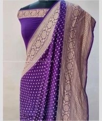 Purple and Cream color Georgette sarees with bindi weaving body and zari woven pairs with tassels and woven borders both sides design -GEOS0009735