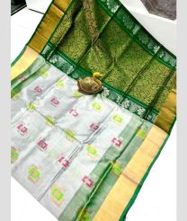 Cream and Pine Green color uppada pattu handloom saree with all over buttas design -UPDP0021916