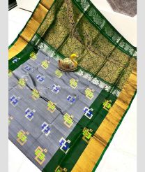 Grey and Pine Green color uppada pattu handloom saree with all over buttas design -UPDP0021915