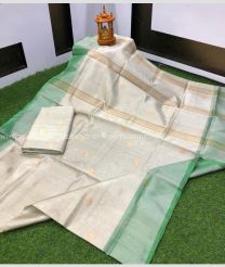 Cream and Lite Green color Uppada Tissue handloom saree with all over dollar buties saree design -UPPI0000385