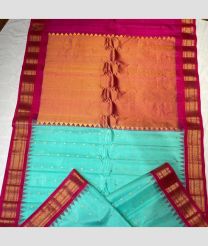 Turquoise and Pink color gadwal pattu handloom saree with all over buties with temple kuthu interlock woven border design -GDWP0001702