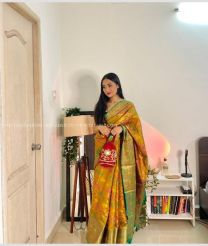 Dark Green and Orange color Banarasi sarees with all over printed design -BANS0002218