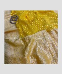 Mustard Yellow and Cream color Georgette sarees with bindi weaving body and zari woven pairs with tassels and woven borders both sides design -GEOS0009739