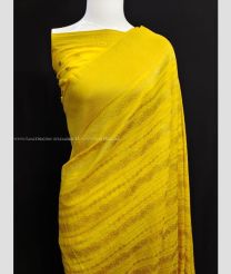 Yellow color Georgette sarees with all over zari weaving with fancy tassels having heavy wooven border design -GEOS0009502