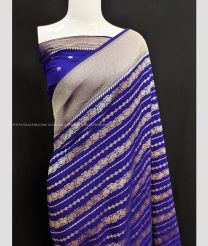 Navy Blue color Georgette sarees with all over zari weaving with fancy tassels having heavy wooven border design -GEOS0009503