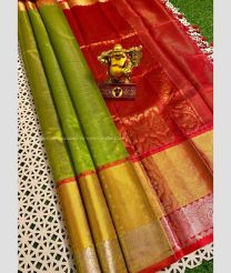 Parrot Green and Red color kuppadam pattu handloom saree with all over small silver nd gold zari weaved butties with contrast borders and jari weaver kanchi borders design -KUPP0096668