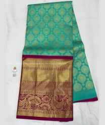 Turquoise and Magenta color kanchi Lehengas with all over buties with kanchi border design -KAPL0000169