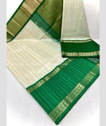 Half White and Dark Green color kuppadam pattu handloom saree with all over jari checks and buties with kuppadam kanchi border design -KUPP0097086