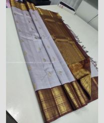 Sky Blue and Chocolate color kanchi pattu handloom saree with all over big buties with 2g pure jari traditional korvai pattern border design -KANP0013323