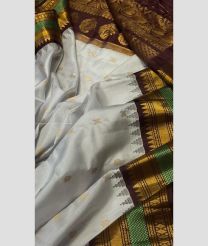 Cream and Chocolate color gadwal pattu handloom saree with all over woven buties including muniya with bentex and temple kothakomma kuthu interlock border design -GDWP0001623