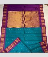 Medium Teal and Magenta color gadwal pattu handloom saree with all over buties with temple kuthu interlock woven border design -GDWP0001703