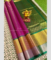 Magenta and Pine Green color kuppadam pattu handloom saree with all over small silver nd gold zari weaved butties with contrast borders and jari weaver kanchi borders design -KUPP0096676