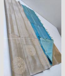 Cream and Sky Blue color soft silk kanchipuram sarees with all over buties and checks with double warp border design -KASS0000977