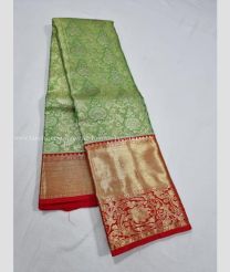 Lite Green and Red color kanchi pattu handloom saree with peacock and flower border design -KANP0004902