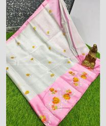 Half White and Rose Pink color linen sarees with all over embroidery hand work buties with tissue border design -LINS0003570