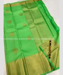 Parrot Green and Golden kanchi pattu sarees with All over Buttas design - KANP0017687