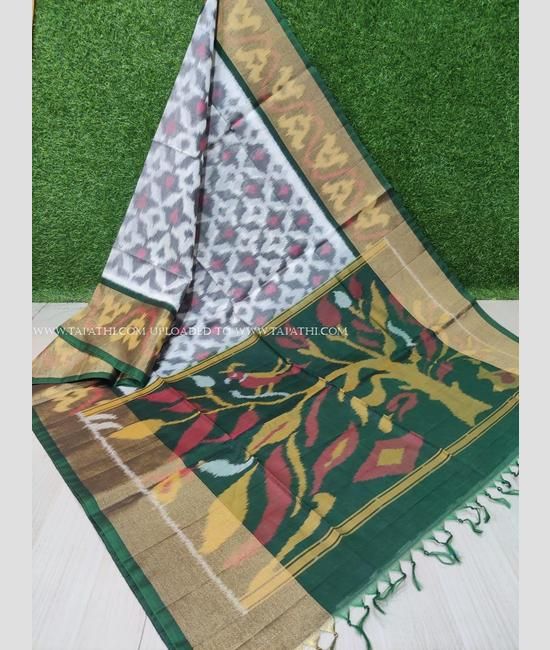 Half White and Dark Green color ikkat sico sarees handloom saree with All over Pochampally design